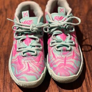 Vibrant Pink and Blue Sneakers with Swirling Design